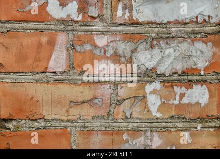 Red brick and brick edge from pillar in front of wall as texture background Stock Photo