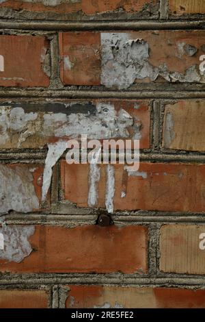 Red brick and brick edge from pillar in front of wall as texture background Stock Photo