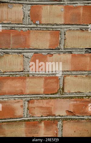 Red brick and brick edge from pillar in front of wall as texture background Stock Photo