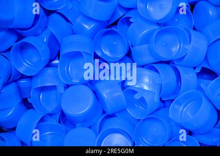 Bottling factory worker inspecting quality of water bottles before shipment. Reverse osmosis system used in plant. water purity and maintaining Stock Photo