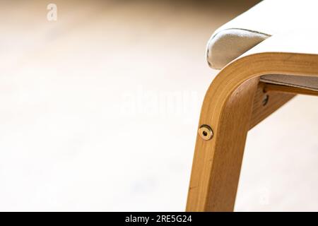 Interior design detail abstract geometric background. Chair detail as geometric backdrop in natural wood colors Stock Photo
