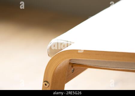 Interior design detail abstract geometric background. Chair detail as geometric backdrop in natural wood colors Stock Photo