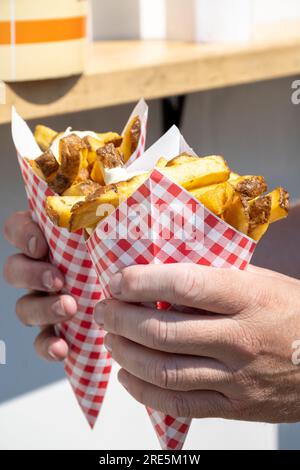 French fries in a paper bag with sauces. Top view Stock Photo - Alamy