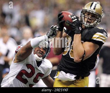 FILE - New Orleans Saints tight end Juwan Johnson (83) attempts to block Cleveland  Browns defensive end Myles Garrett (95) during an NFL football game,  Saturday, Dec. 24, 2022, in Cleveland. As