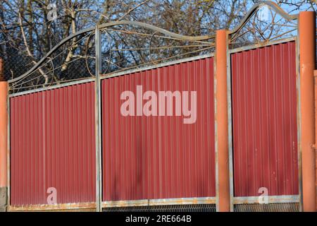 The fence, which is mounted from a metal profile Stock Photo