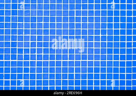 Empty surface with pattern of small azure blue square tiles. Stock Photo