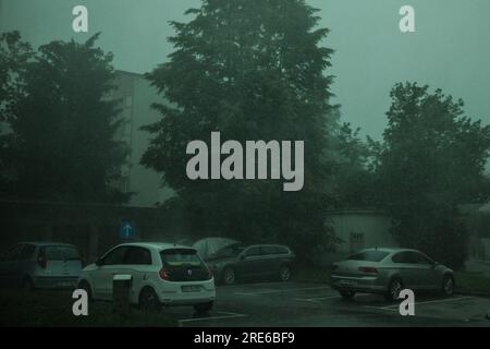 A strong thunderstorm with strong winds hits the city of Kranj. Severe storms with strong winds, large hail and torrential rain have been sweeping over Northern Italy and Slovenia for weeks, causing a lot of damage from hail, hurricane winds, tornadoes and flash flooding. Several people have lost their lives in Italy, Slovenia and Croatia. Stock Photo