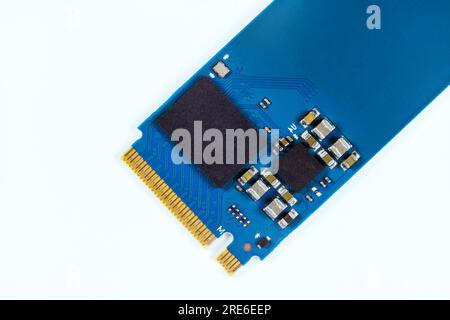 High-speed capabilities of an NVME M2 SSD disk make it perfect choice for data storage on desktop computer against white background. Stock Photo
