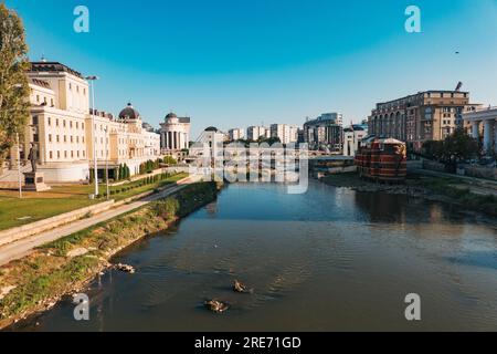 a much-ridiculed fake galleon ship mounted on the banks of the Vardar River in Skopje, North Macedonia as part of a 2014 project Stock Photo