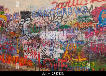 The Lennon Wall is a wall in Prague, Czech Republic. Once a normal wall, since the 1980s it has been filled with John Lennon-inspired graffiti and pie Stock Photo