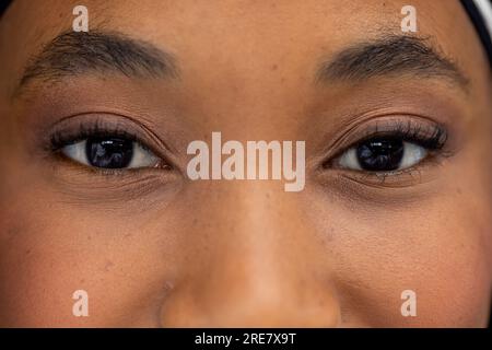 Close up of eyes of african american businesswoman at office Stock Photo