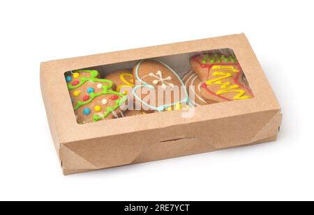 Christmas gingerbread in paper box isolated on white Stock Photo