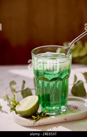 Refreshment healthy detox citrus green sparkling mocktail. Non alcoholic vitaminized healthy beverage. Green Appletini Mocktail for St. Patricks Day Stock Photo