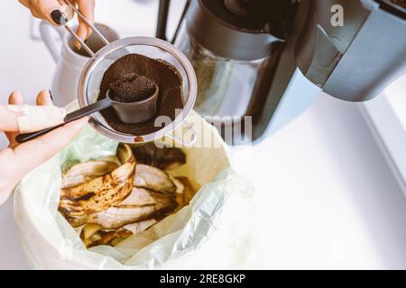 Throwing Away Used Coffee Ground Stock Photo