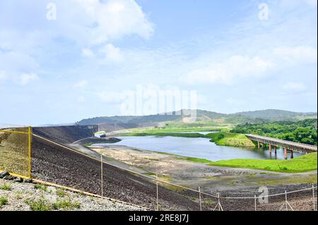 Bridge over the Suriname River at Afobaka and the Brokopondo hydroelectric plant. The fencing belongs to the Brokopondo power plant;  Suriname Stock Photo