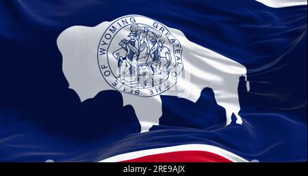 Close-up of Wyoming state flag waving in the wind. White Bison silhouette. 3d illustration render. Fluttering fabric background. US state flag Stock Photo