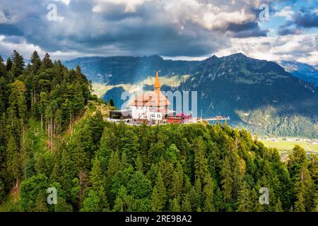 Beautiful top of Harder Kulm in Swiss Interlaken in summer sunset. Turquoise Lake Thun and Brienz in background. Stunning scenery on top of Harder Kul Stock Photo