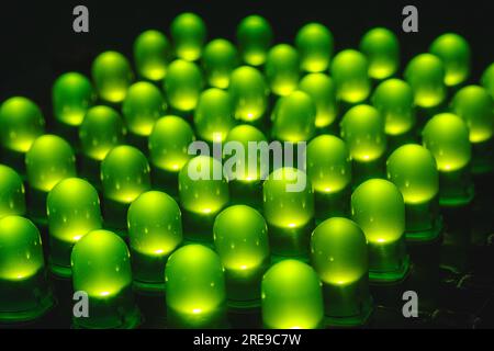 Closeup of several leds through Hole the green colour on table in dim room Stock Photo