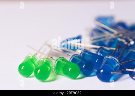 Closeup varios of Through Hole led diodes green and blue, electronic component Stock Photo