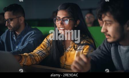 Smart Young Students Studying in University with Diverse Multiethnic Classmates. Scholars Have a Conversation in College Room. Applying Knowledge Stock Photo