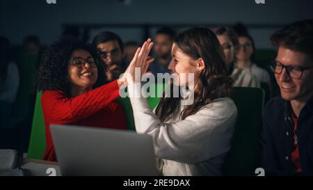 Smart Young Students Studying in University with Diverse Multiethnic Classmates. Scholars Have a Conversation in College Room. Applying Knowledge Stock Photo