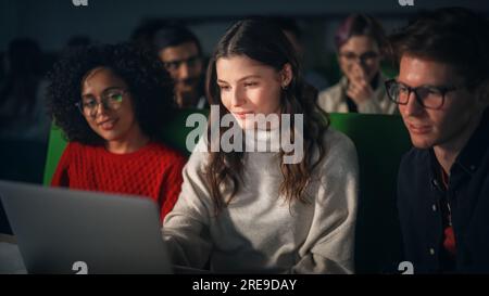 Smart Young Students Studying in University with Diverse Multiethnic Classmates. Scholars Have a Conversation in College Room. Applying Knowledge Stock Photo
