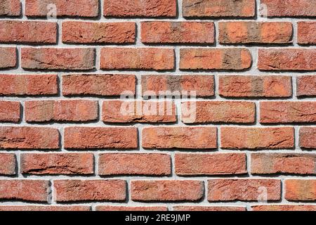 Background from a wall made of red bricks Stock Photo