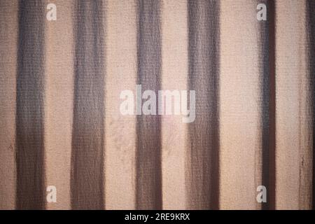 Ribbed texture. Blinds on window. Material Details. Fabric surface. Stock Photo