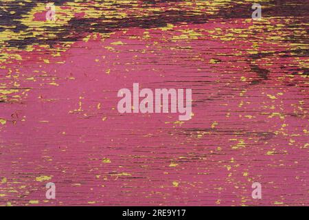 Peeling paint from a wooden board - surface texture. Stock Photo