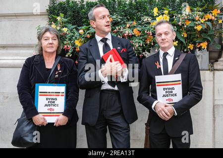 London, UK. 26th July, 2023. Protesters hold "Dying for Justice" placards. Protesters and supporters of victims and bereaved families congregate outside the Infected Blood Inquiry in central London where Prime Minister Rishi Sunak made an appearance today. The inquiry is ongoing. Credit: Imageplotter/Alamy Live News Stock Photo