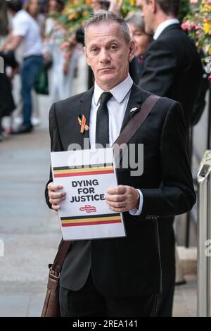 London, UK. 26th July, 2023. Protesters hold "Dying for Justice" placards. Protesters and supporters of victims and bereaved families congregate outside the Infected Blood Inquiry in central London where Prime Minister Rishi Sunak made an appearance today. The inquiry is ongoing. Credit: Imageplotter/Alamy Live News Stock Photo