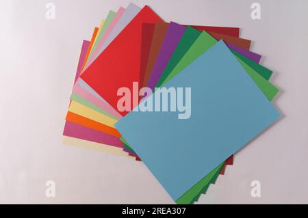 Stack of colorful paper of different colors ,top view..Minimal concept. Stock Photo