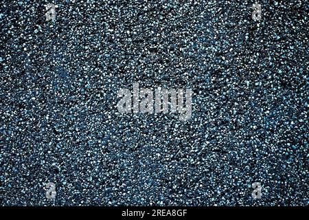 Perfect mottled empty dark background with lighter flecks. Stock Photo