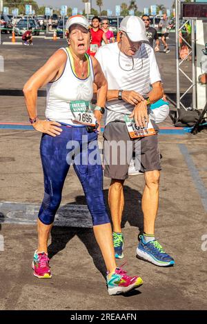 Costa Mesa, California, USA. 5th Aug, 2018. A senior couple are exhausted at the finish line of a community foot race in Costa Mesa, CA. (Credit Image: © Spencer Grant/ZUMA Press Wire) EDITORIAL USAGE ONLY! Not for Commercial USAGE! Stock Photo