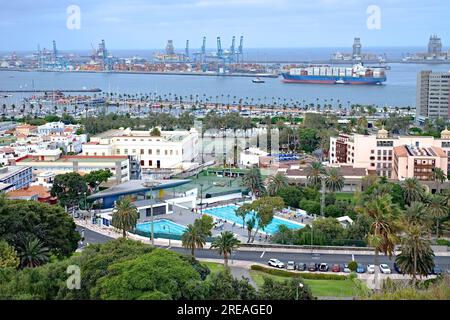 Las Palmas, Canary Islands / Spain - September 10 2020: Panamax container ship enters harbour helped by tug boats. Stock Photo