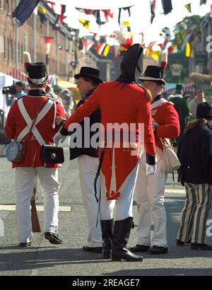 AJAXNETPHOTO. 1998 - FESTIVAL OF THE SEA - PORTSMOUTH. THE ROYAL NAVY DOCKYARD'S ANCHOR LANE WAS TRANSFORMED IN TO AN 18TH CENTURY MARKET WITH STALLS SELLING ALL TYPES OF MARINE ARTIFACTS. PHOTO:JONATHAN EASTLAND/AJAX REF:HDD FOTS98 ANCHORLANE Stock Photo