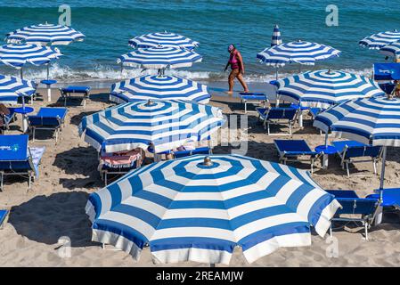 The beach in Cefalù on a sunny day in July. Historic Cefalù is a major tourist destination on Sicily. Stock Photo