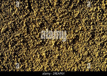 Perfect empty dark yellow dimpled background. Stock Photo