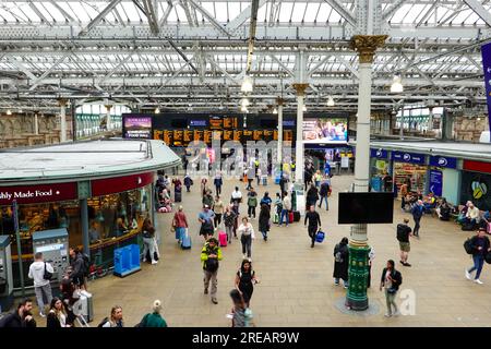 Bustling crowd of people inside Waverley train station, Edinburgh ...
