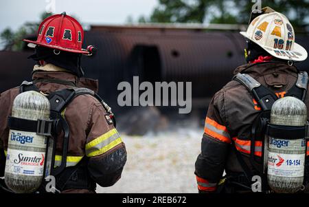 Sumter Fire Department students take part in an aircraft live fire exercise at Shaw Air Force Base, S.C., June 21, 2023. Shaw Fire & Emergency Services and the Sumter Fire Department have a strong mutual aid agreement whereby the agencies often work and train together.  (U.S. Air Force photo by Airman 1st Class Meghan Hutton) Stock Photo