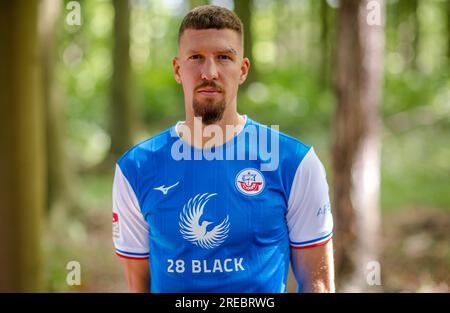 Bad Doberan, Germany. 20th July, 2023. Janik Bachmann from FC Hansa Rostock. Credit: Jens Büttner/dpa - IMPORTANT NOTE: In accordance with the requirements of the DFL Deutsche Fußball Liga and the DFB Deutscher Fußball-Bund, it is prohibited to use or have used photographs taken in the stadium and/or of the match in the form of sequence pictures and/or video-like photo series./dpa/Alamy Live News Stock Photo