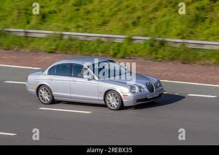 2005 Jaguar S-Type Sport Diesel Auto DT V6 Auto Silver Car Saloon Diesel 2720 cc travelling at speed on the M6 motorway in Greater Manchester, UK Stock Photo