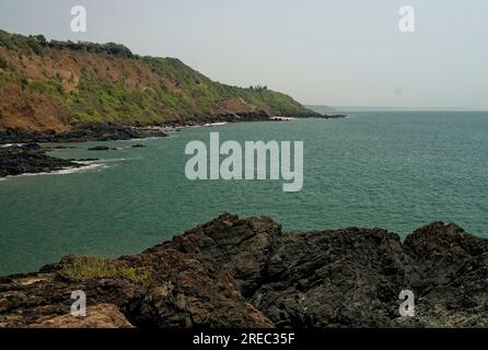 Rocky beach of Nivati taluka Vengurla district Sindhudurga state Maharashtra India Stock Photo