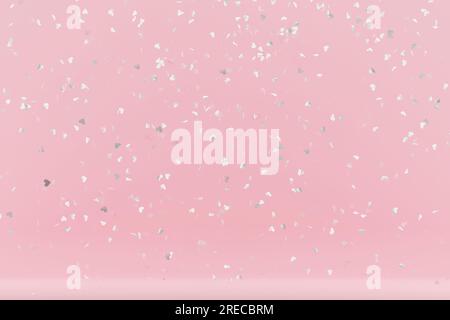 Confetti heart shape on pastel pink background. 3d rendering Stock Photo