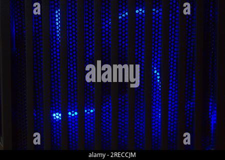 Cooler of processor with neon light. LED Light, CPU Cooler. Computer circuit board and CPU cooling fans illuminated by internal LEDs inside a computer Stock Photo