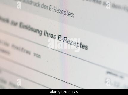 Berlin, Germany. 24th July, 2023. A screen in a pharmacy displays information about e-prescriptions. Credit: Jens Kalaene/dpa/Alamy Live News Stock Photo