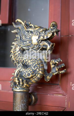 Close-up of faucet handrail on traditional Chinese wooden door Stock Photo