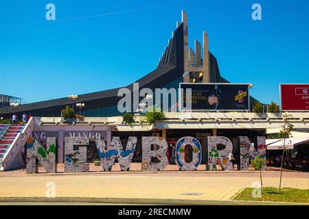 PRISTINA, KOSOVO - AUGUST 13, 2019: Newborn Monument in front of Youth and Sports Center in Pristina, Kosovo Stock Photo