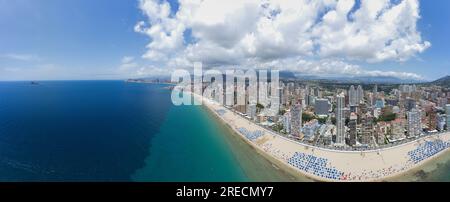 Extremely wide angle panoramic aerial photo of the city of Benidorm in Spain showing a panoramic drone view of the whole of Benidorm and the high rise Stock Photo