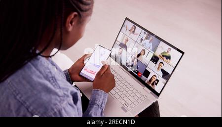 Watching Video Conference Business Webinar On Computer Stock Photo